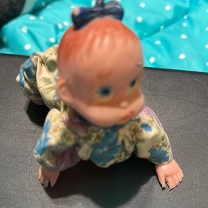 Antique crawling doll that winds up